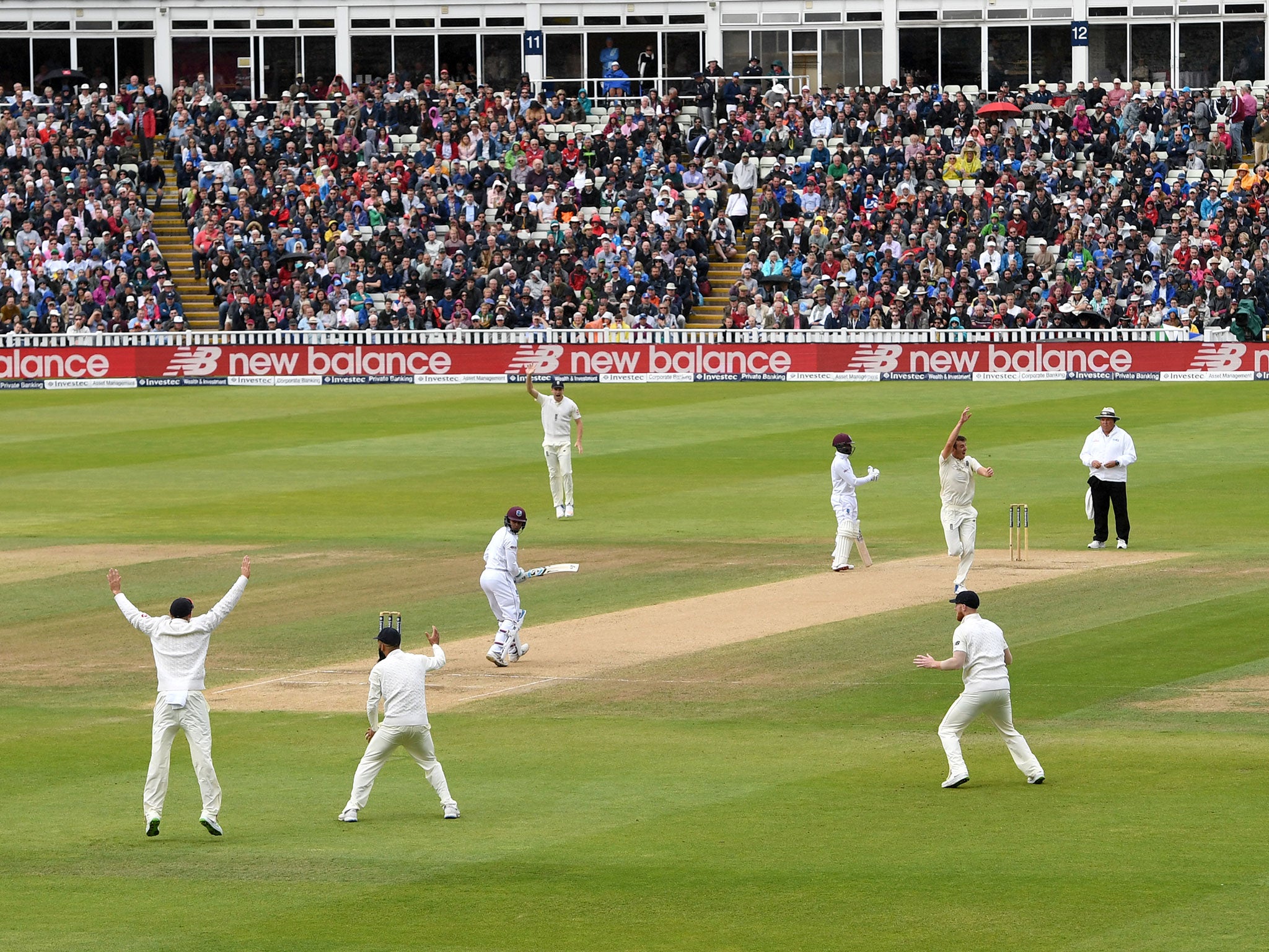 England appeal successfully for the wicket of Shane Dowrich