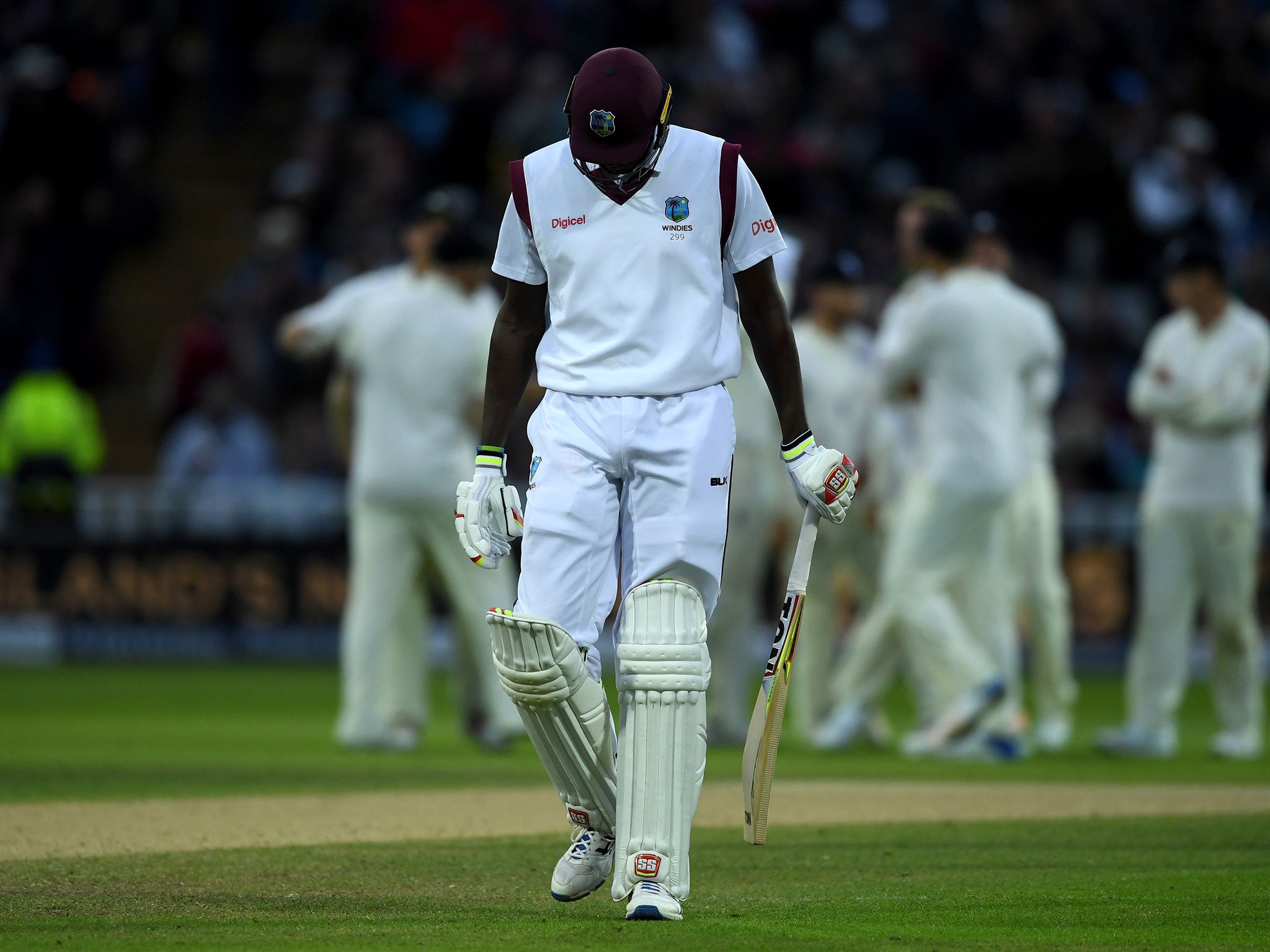 West Indies captain Jason Holder leaves the field after being dismissed by Stuart Broad