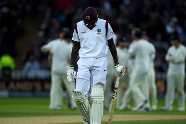 West Indies captain Jason Holder leaves the field after being dismissed by Stuart Broad