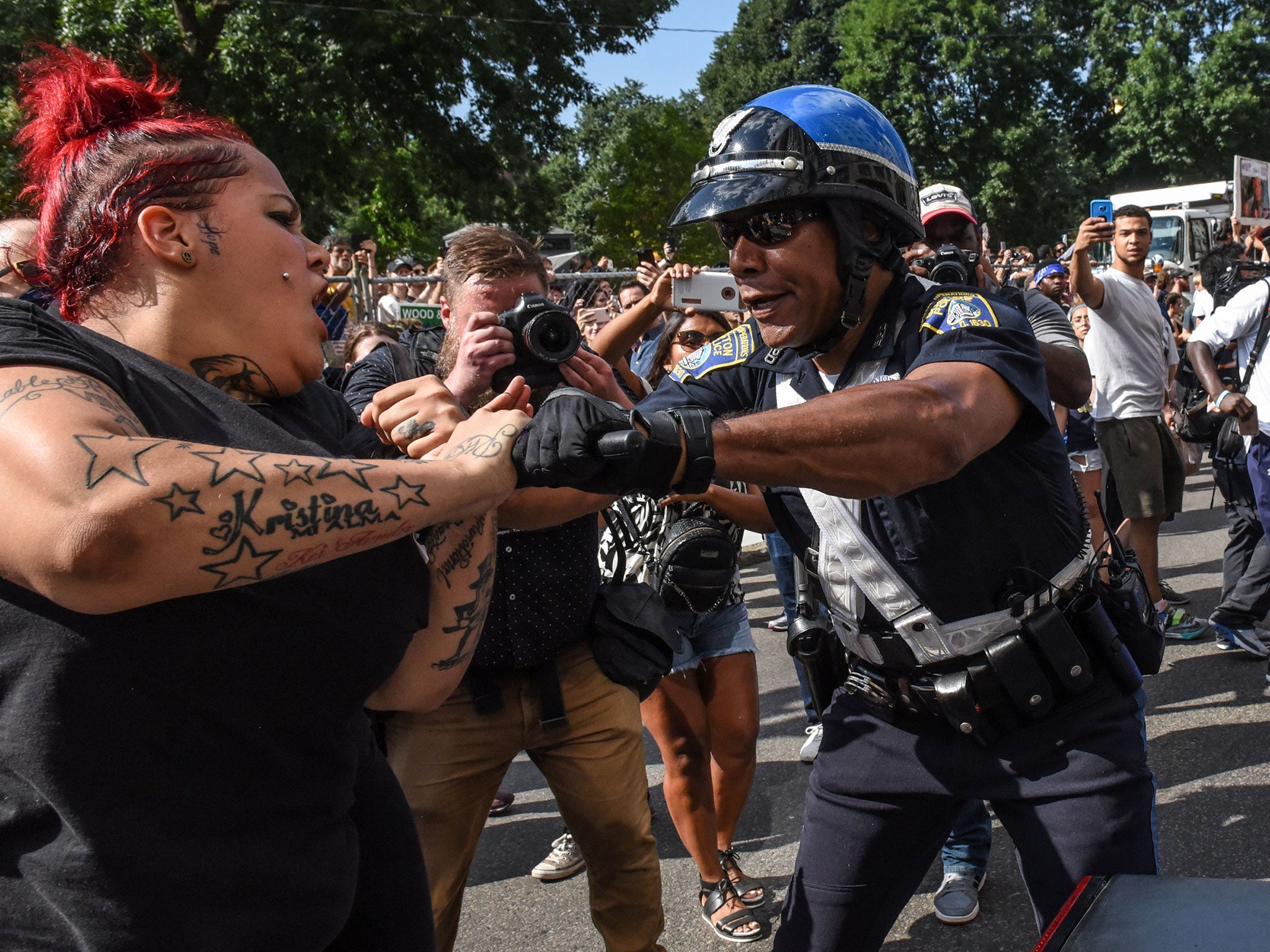 &#13;
Counter-protesters clash with Boston Police outside of the Boston Commons and the Boston Free Speech Rally in Boston, Massachusetts, U.S., August 19, 2017 &#13;