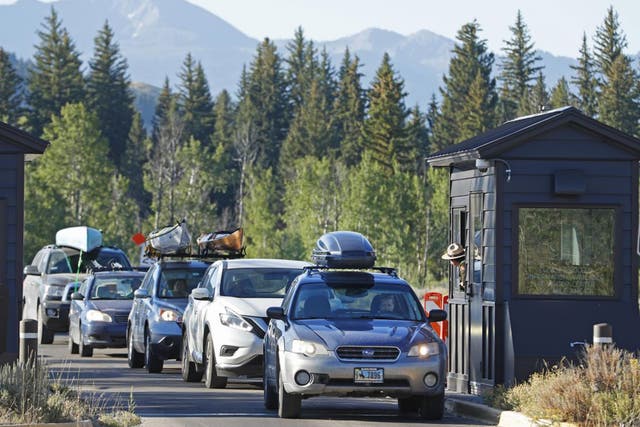 Cars entering the Grand Teton National Park in Jackson, Wyoming