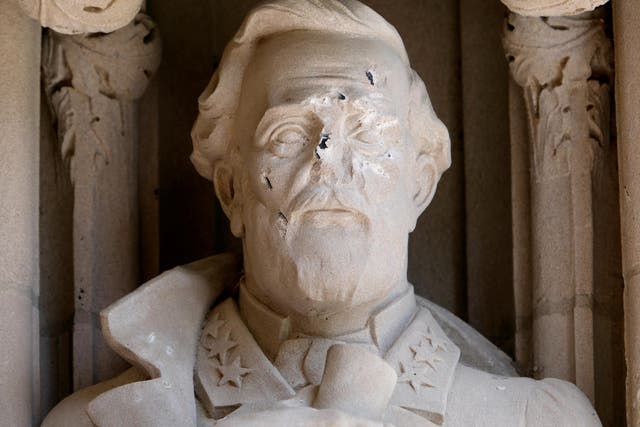 A damaged statue of Confederate commander General Robert E. Lee at Duke University in Durham, North Carolina, as the debate continues over the questionable message conveyed by Southern Civil War monuments