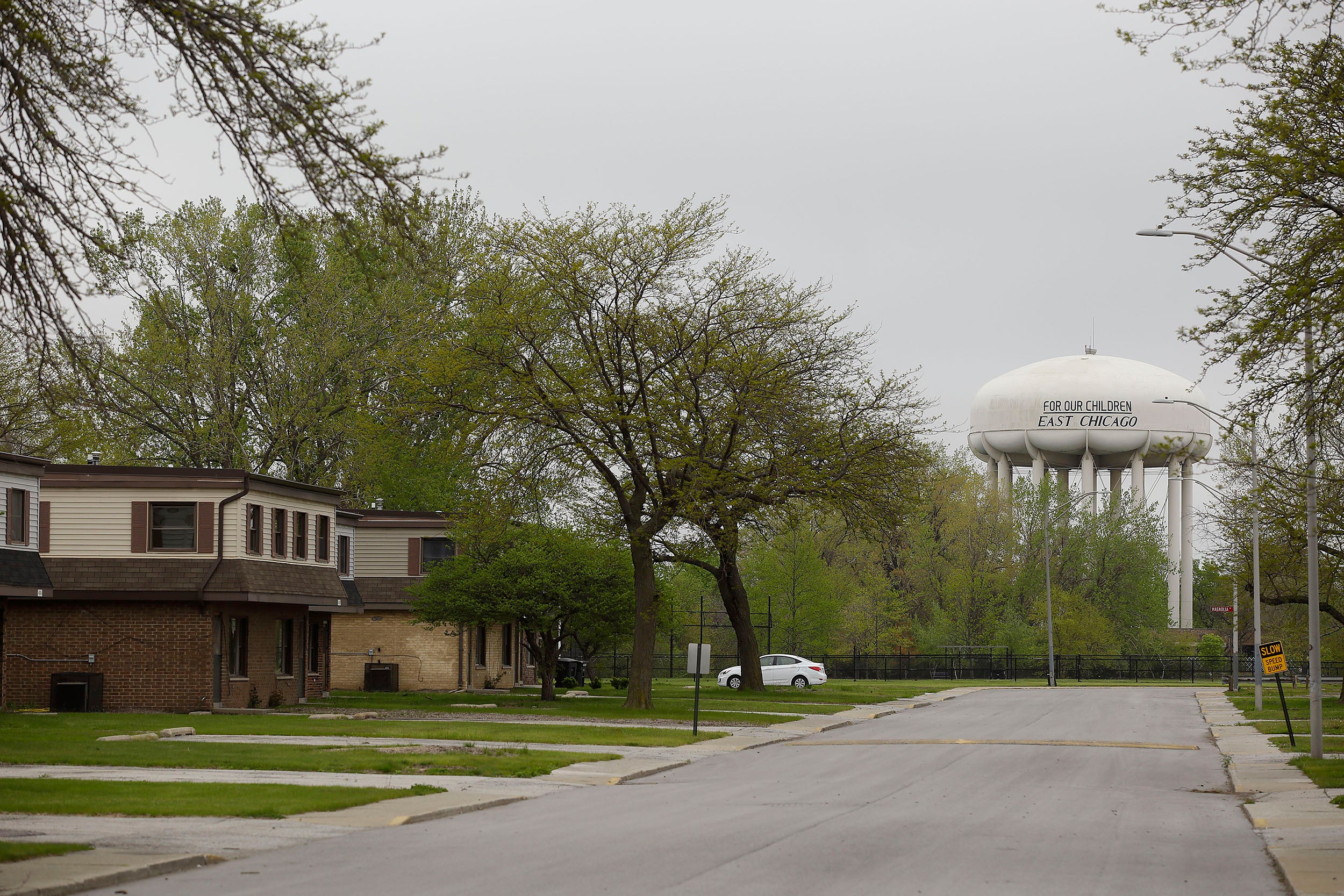 An empty road runs through the West Calumet Housing Complex