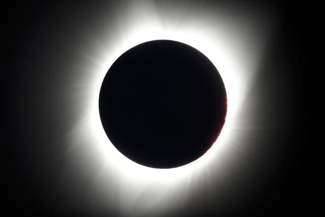 The moon covers the sun during a total eclipse
