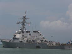 Divers recover remains of missing sailors from US destroyer