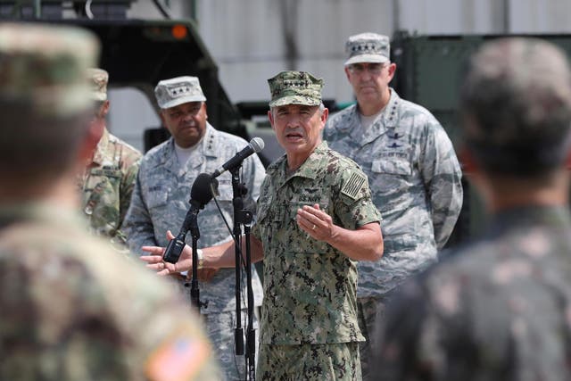 US Pacific Command Commander Admiral Harry Harris Jr answers a reporter's question during a press conference at Osan Air Base in Pyeongtaek in South Korea