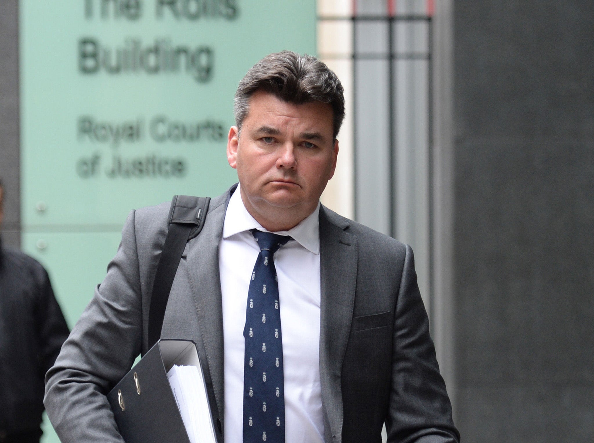 Dominic Chappell outside the High Court in London where a bid by BHS administrators to take control of the company he used to extract millions of pounds from the dying store chain was adjourned
