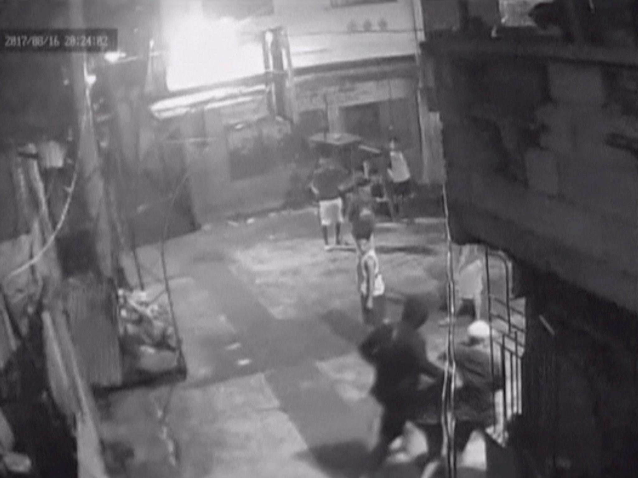 CCTV footage appearing to show Kian Loyd delos Santos being dragged by plain-clothed police past a basketball court in Caloocan City Barangay, Philippines