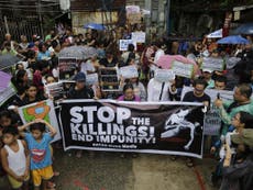 Duterte urged to stop drug war after schoolboy's brutal killing