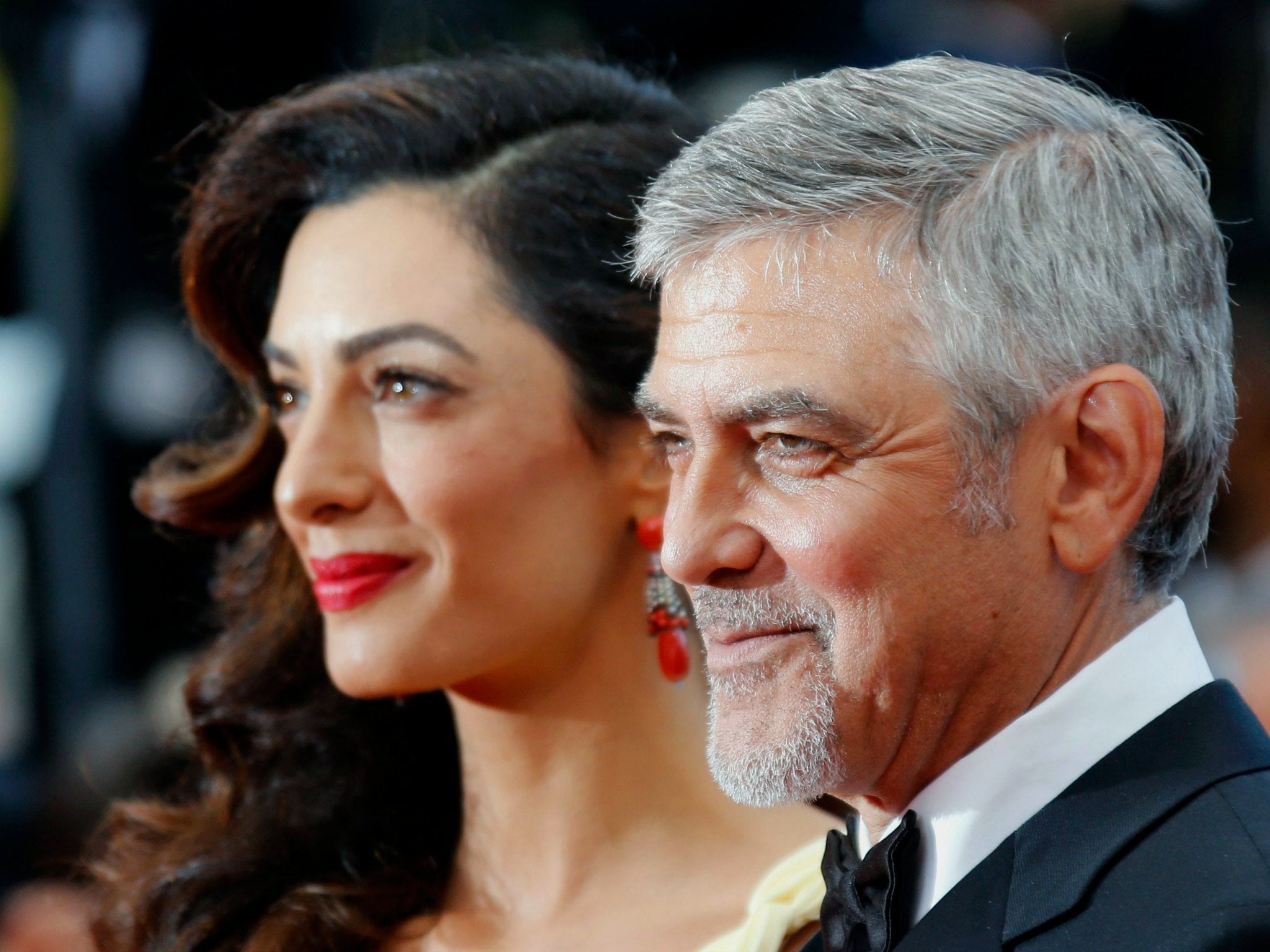 George and Amal Clooney, seen here at the Cannes film festival in May 2016, have pledged $1 million to the Southern Poverty Law Center