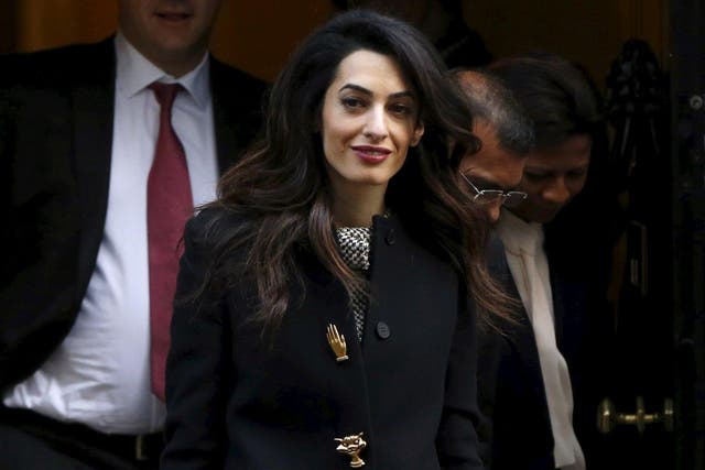 British Lawyer Amal Clooney leaves Downing Street in London.