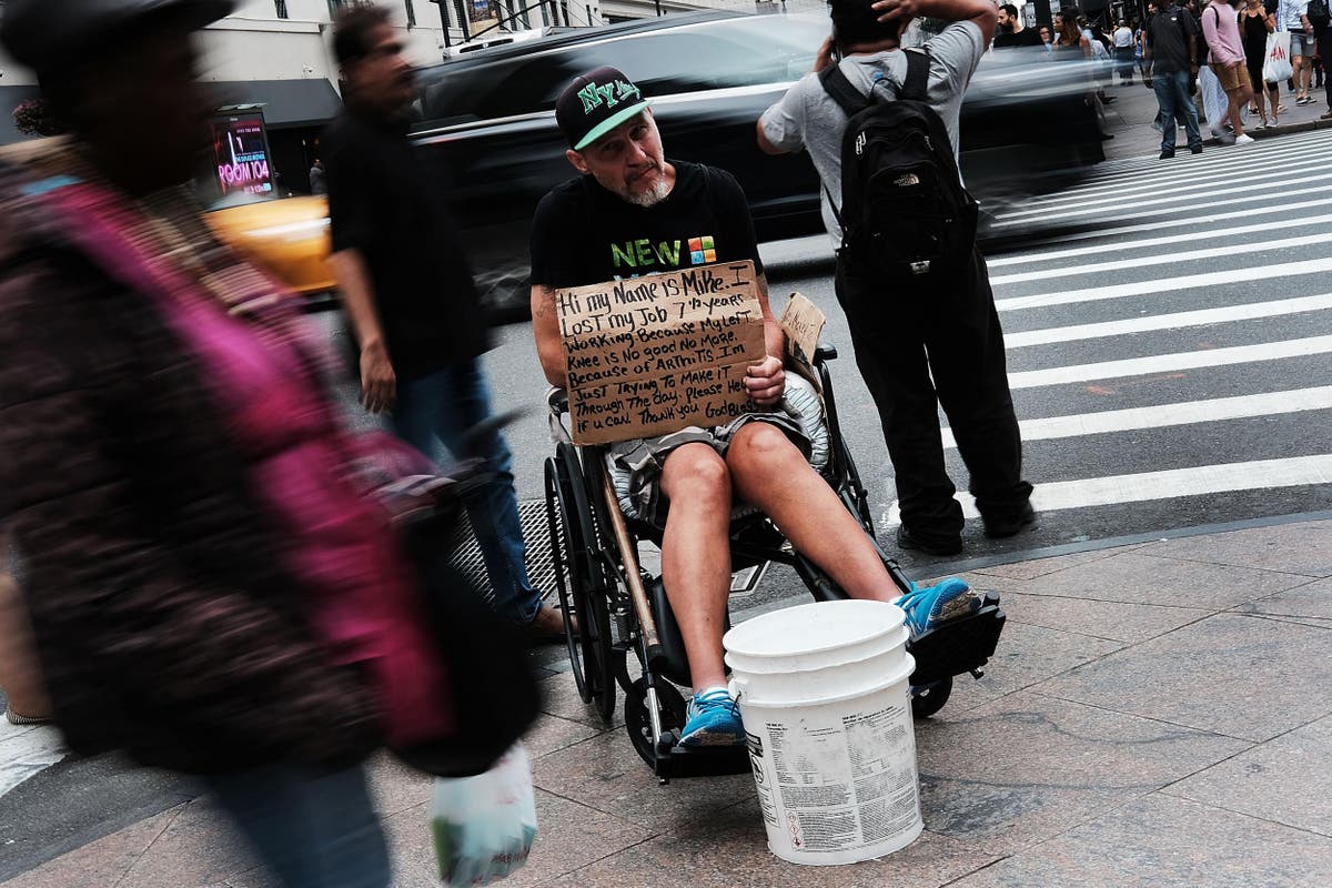 Man takes to streets with sign telling beggars to 'get a job' | The ...