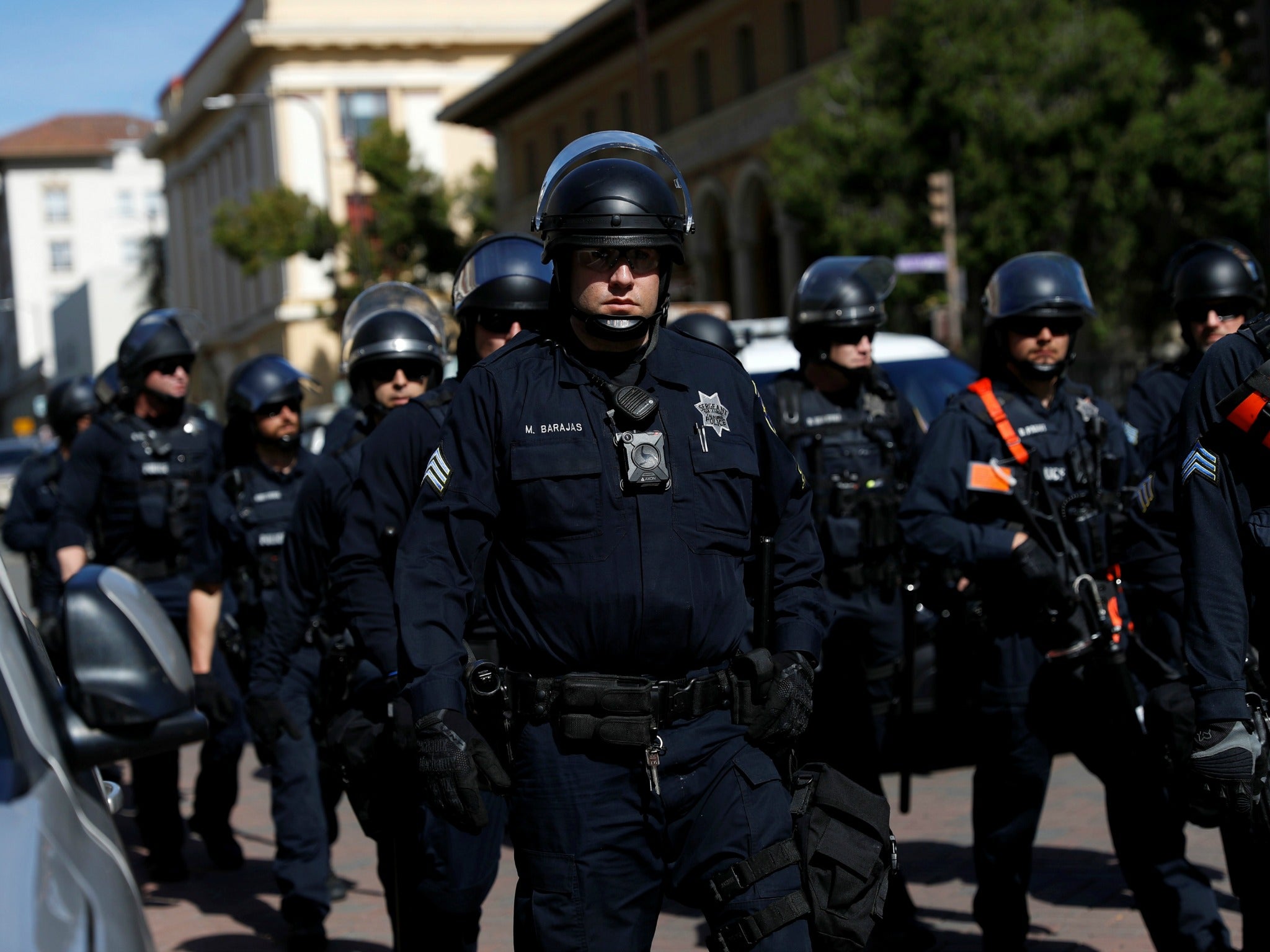 Police officers at protests over the cancellation of conservative provocateur Ann Coulter's speech in Berkeley. Police officials are bracing for violence at a 'No to Marxism in America' rally over the coming weekend.