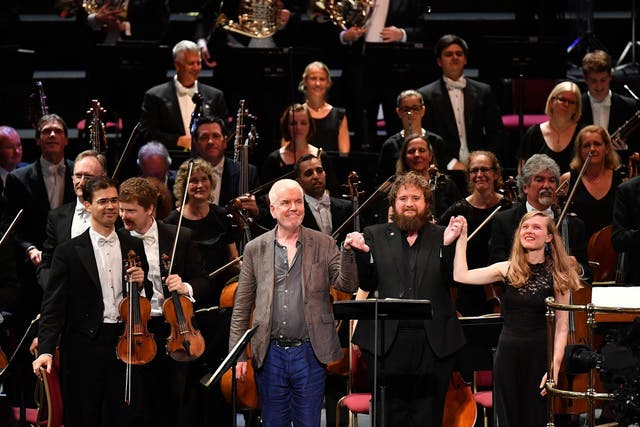 Composer Gerald Barry takes a bow with tenor Allan Clayton and conductor Mirga Gražinytė-Tyla following the world premiere of his work ‘Canada’ with the City of Birmingham Symphony Orchestra at the 2017 BBC Proms