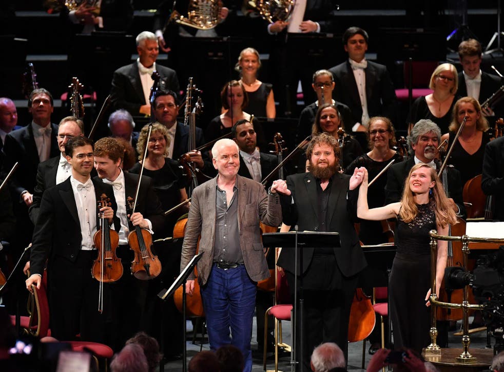 Composer Gerald Barry takes a bow with tenor Allan Clayton and conductor Mirga Gražinytė-Tyla following the world premiere of his work ‘Canada’ with the City of Birmingham Symphony Orchestra at the 2017 BBC Proms