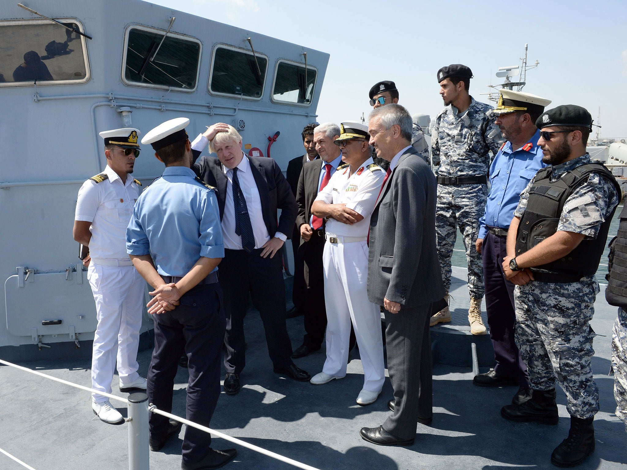 Boris Johnson met members of the Libyan coastguard, who were trained by the Royal Navy, at a Libyan naval base in Tripoli in August