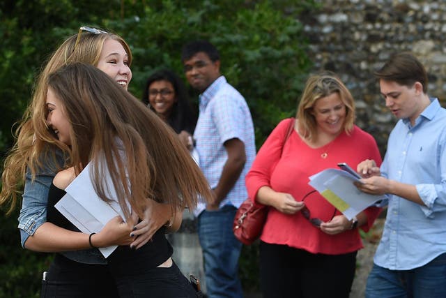 Molly Riordan and Ella Gant (left) celebrate after collecting their GCSE results at Norwich School