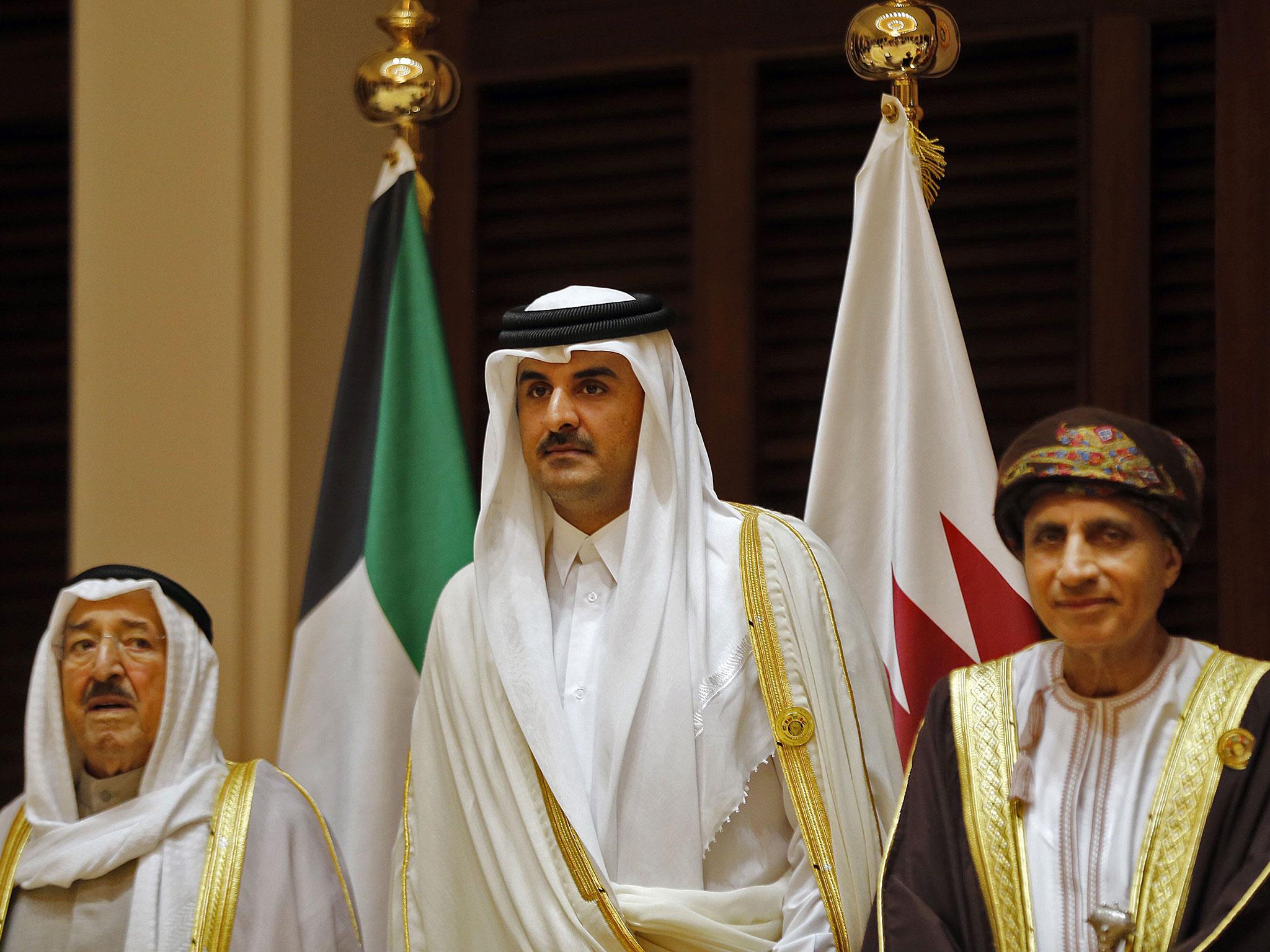 Tamim bin Hamad Al Thani (centre), the Emir of Qatar, has been buoyed by messages of support from the US