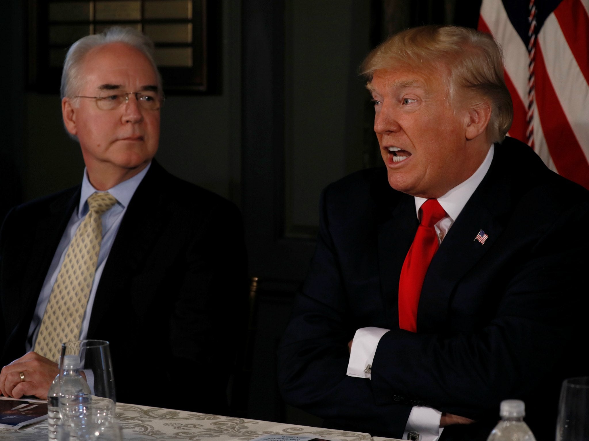 Donald Trump, flanked by Secretary of Health and Human Services Tom Price, at an opioid-related briefing in Bedminster, New Jersey, August 8, 2017.