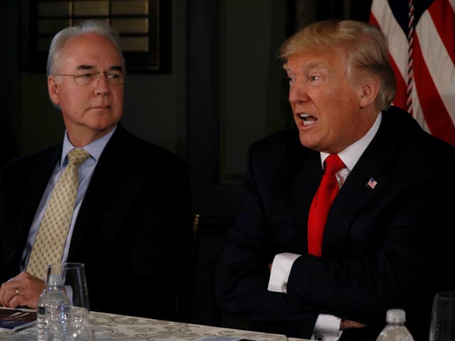 Donald Trump, flanked by Secretary of Health and Human Services  Tom Price, at an opioid-related briefing  in Bedminster, New Jersey, August 8, 2017.