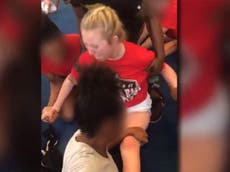 Cheerleading team caught on camera forcing screaming girl into splits