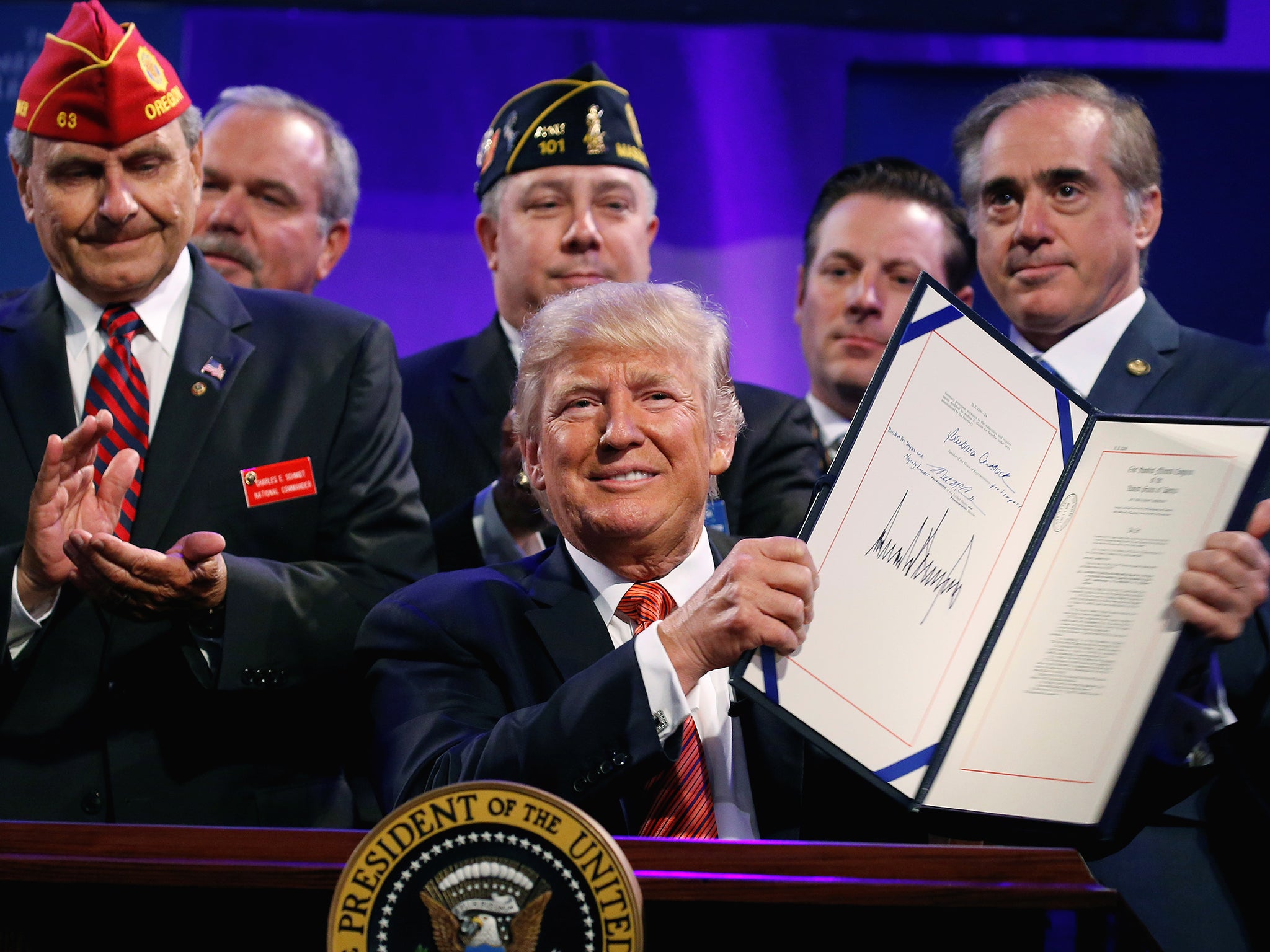 The US President with veterans after singing a bill in Reno, Nevada