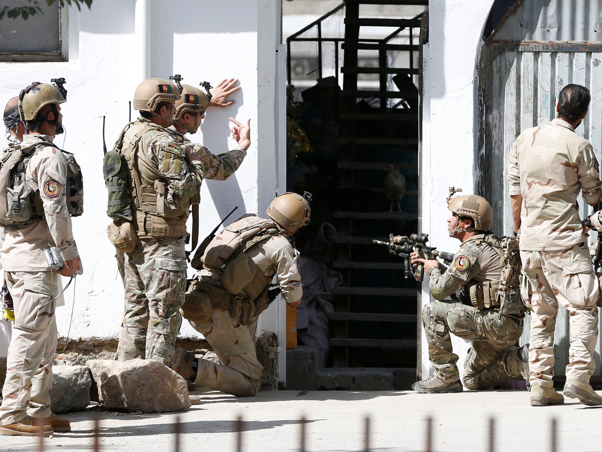 Afghan security forces arrive at the mosque after a recent terror attack in Kabul