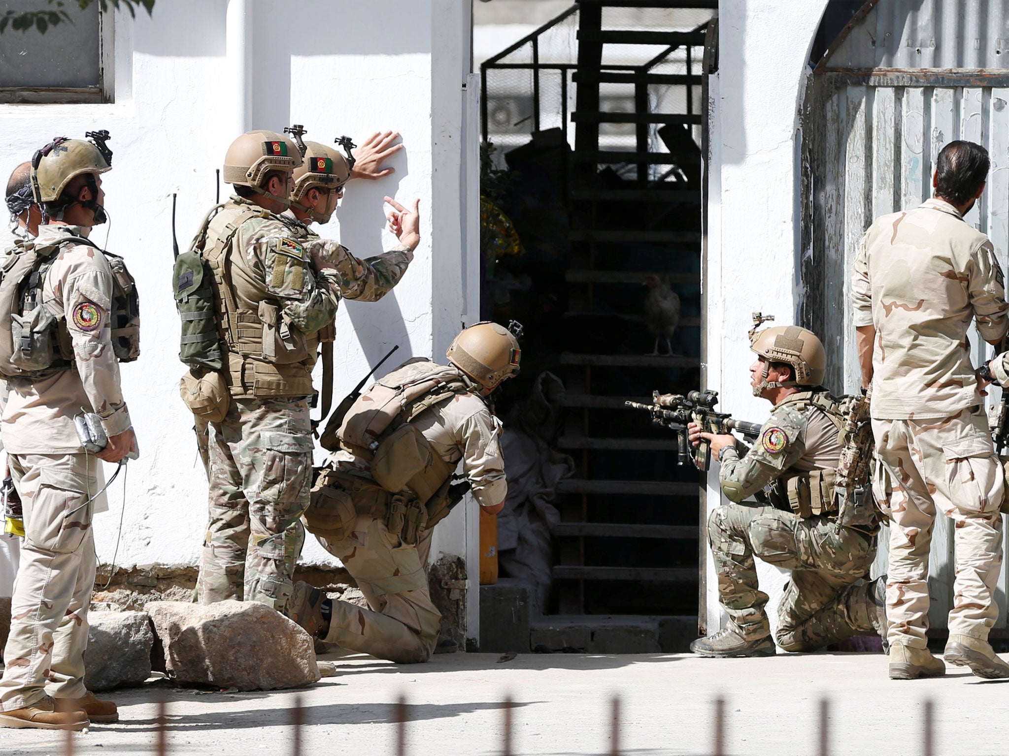 Afghan security forces arrive at the mosque; there have been several attacks against Shia Muslim mosques in Afghanistan in recent weeks