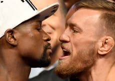 Irish fans roar on McGregor against Mayweather at raucous weigh-in