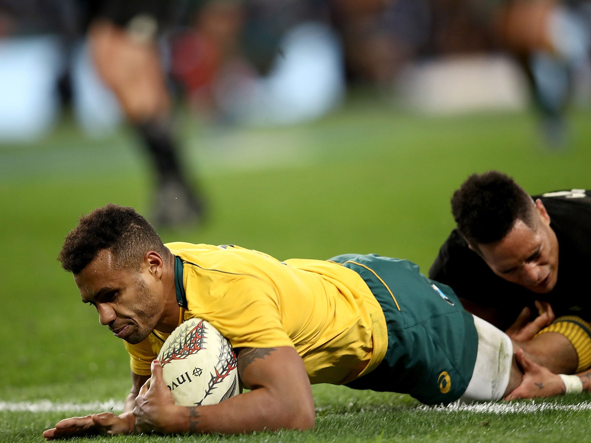 Will Genia crashes over the whitewash to score for Australia