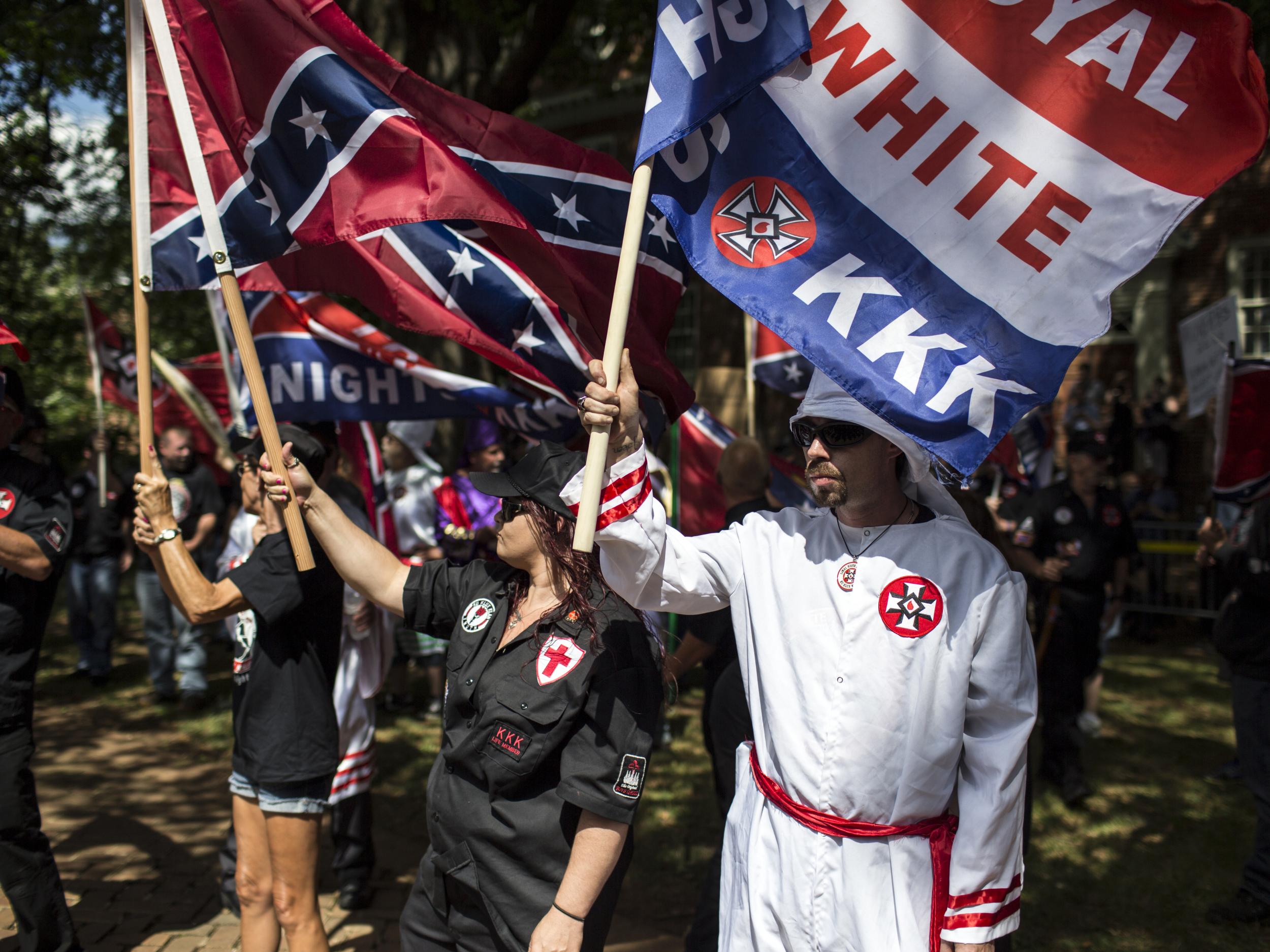Members of the KKK march in Charlottesville, Virginia