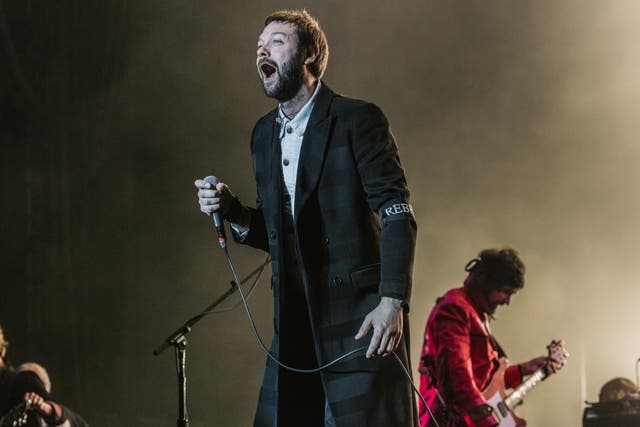 Tom Meighan from Kasabian performs at Reading Festival 2017