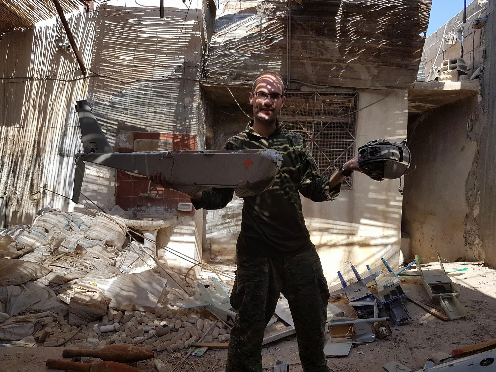 Macer Gifford with a drone modified by Isis found in Raqqa, Syria, in July
