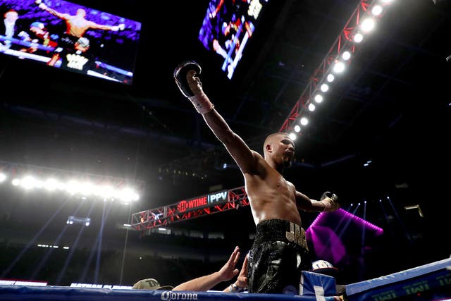 Badou Jack celebrates winning the WBA light-heavyweight title after defeating Nathan Cleverly