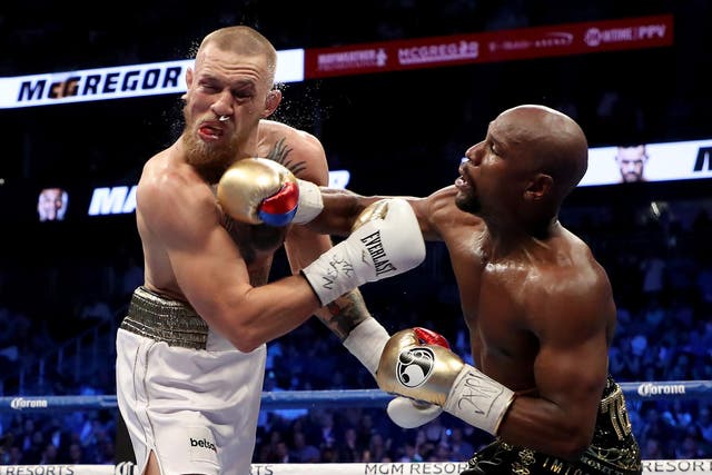 Floyd Mayweather stopped Conor McGregor in the tenth round of their Las Vegas 'super fight'