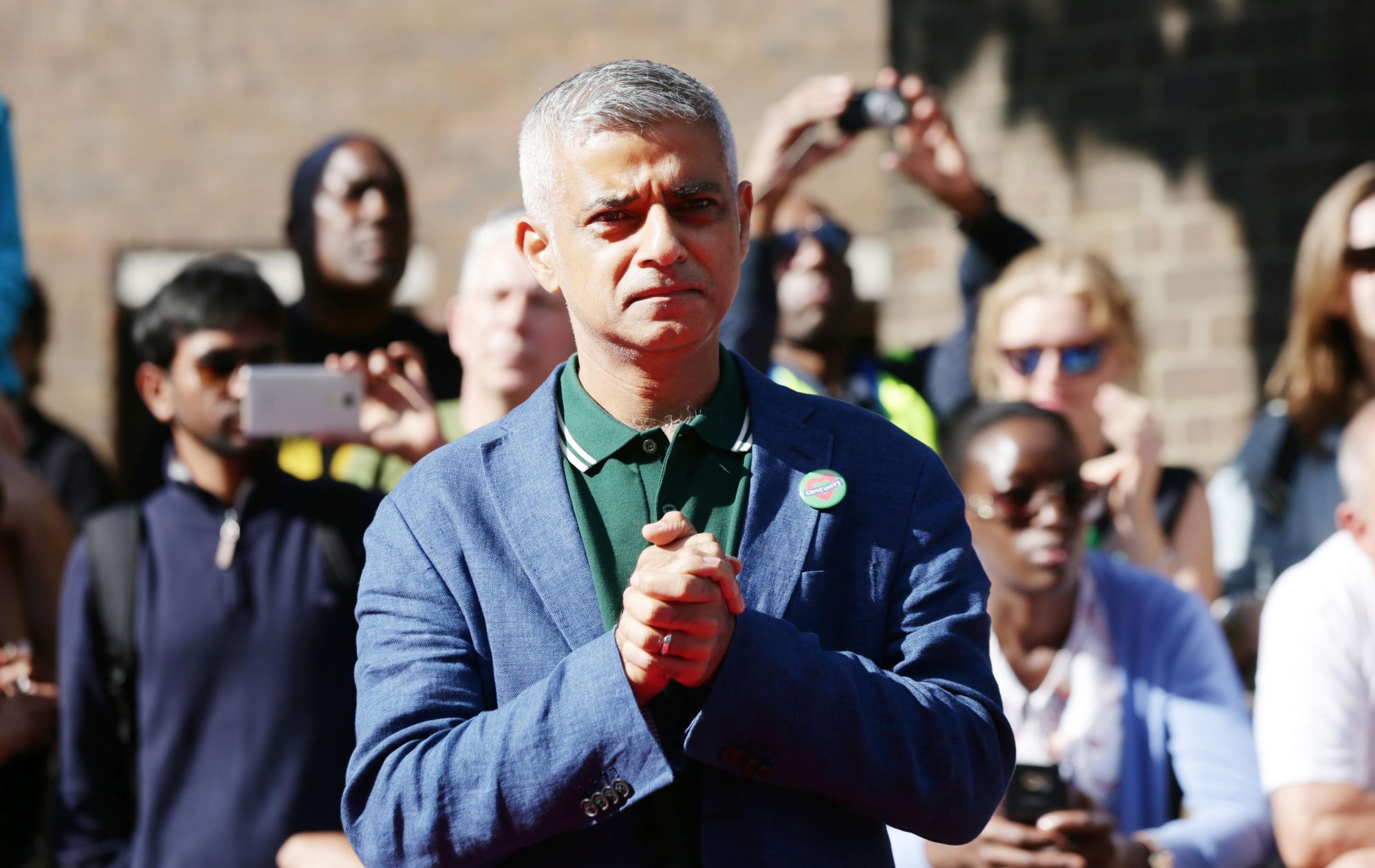 Mayor of London Sadiq Khan wears green in memorial of Grenfell while attending the Notting Hill Carnival