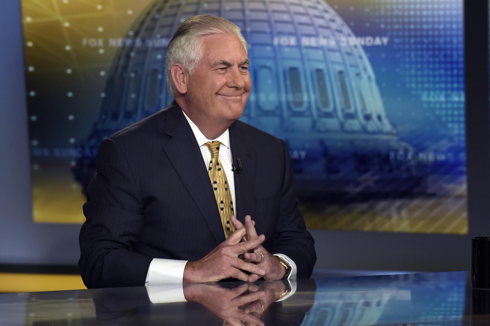 Secretary of State Rex Tillerson smiles after finishing a television interview with Chris Wallace, the anchor of FOX News