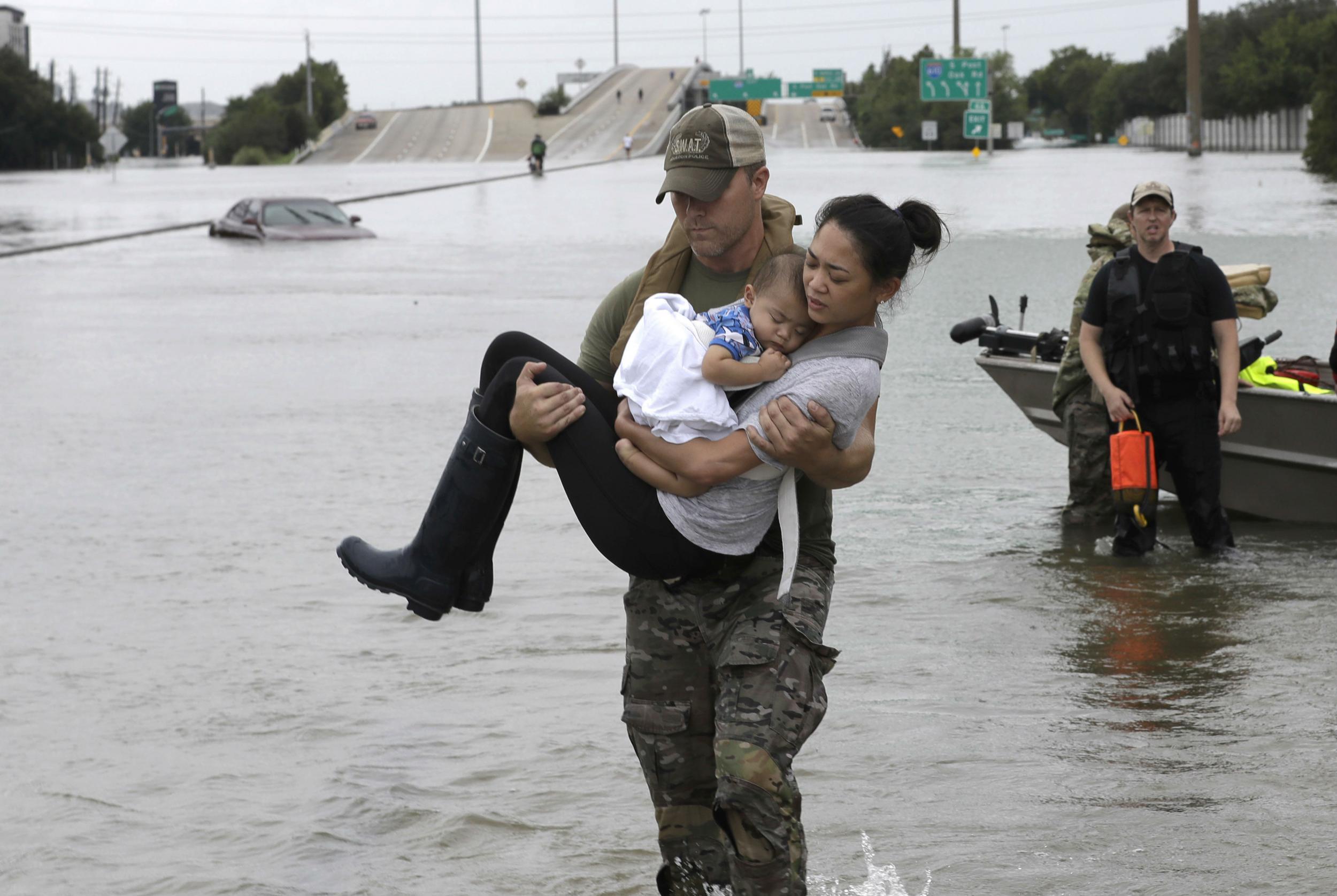 Police rescued at least 1,000 people, while others saved themselves