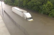 TV crew save life of lorry driver trapped in rising floodwater