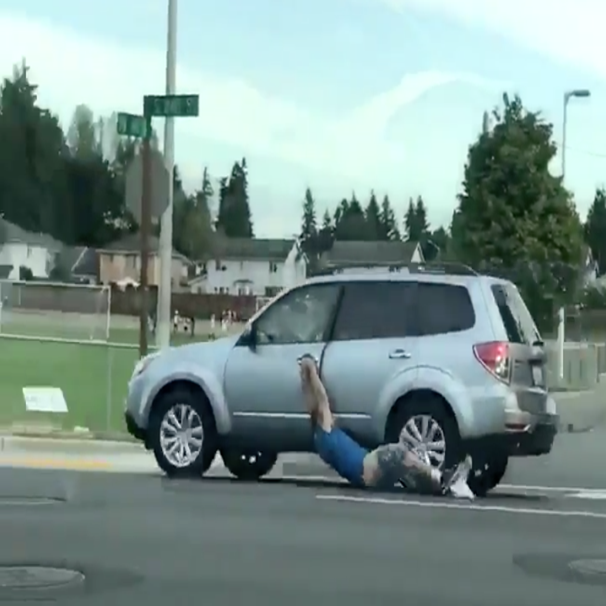 Carjacker in America dragged down street with trousers falling off | The  Independent | The Independent