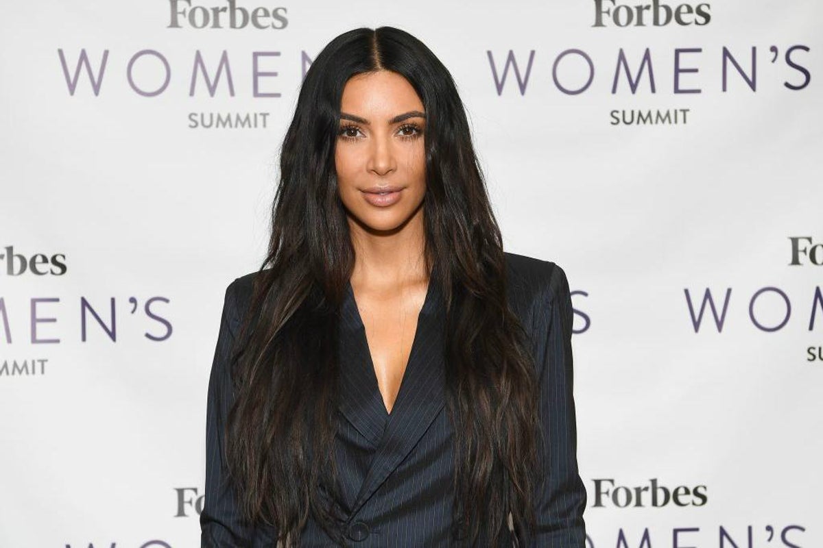 Kim Kardashian suits up for Forbes Women's Conference
