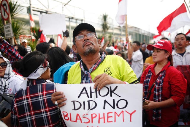 Supporters of Jakarta Governor Basuki Tjahaja Purnama, also known as Ahok, stage a protest in Indonesia after his conviction for blasphemy on 9 May 2017