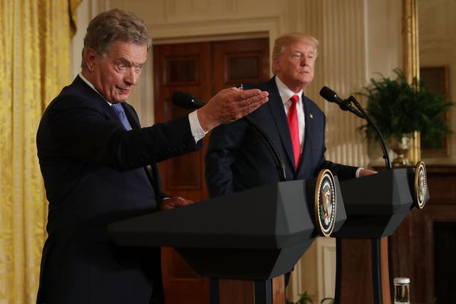 Finnish president Sauli Niinisto and US president Donald Trump hold a joint news conference in the East Room of the White House