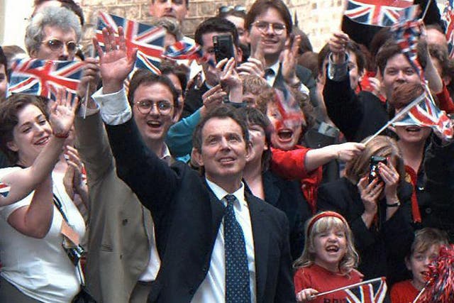 <p>Tony Blair waves to his supporters upon his arrival at Downing Street, after winning the 1997 general election against John Major</p>