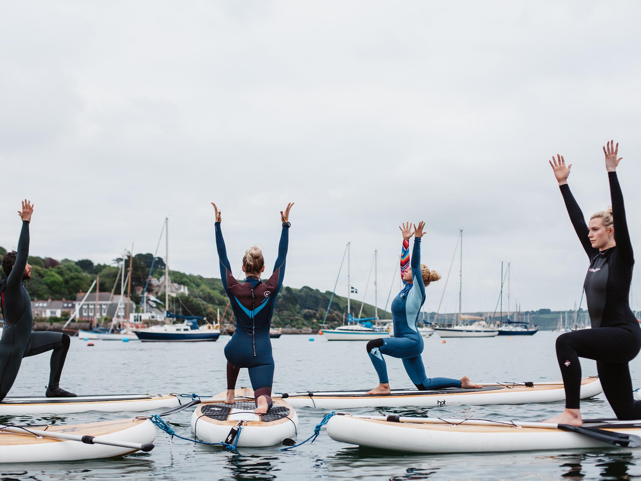 Sunset sup yoga is the perfect way to close out a busy day