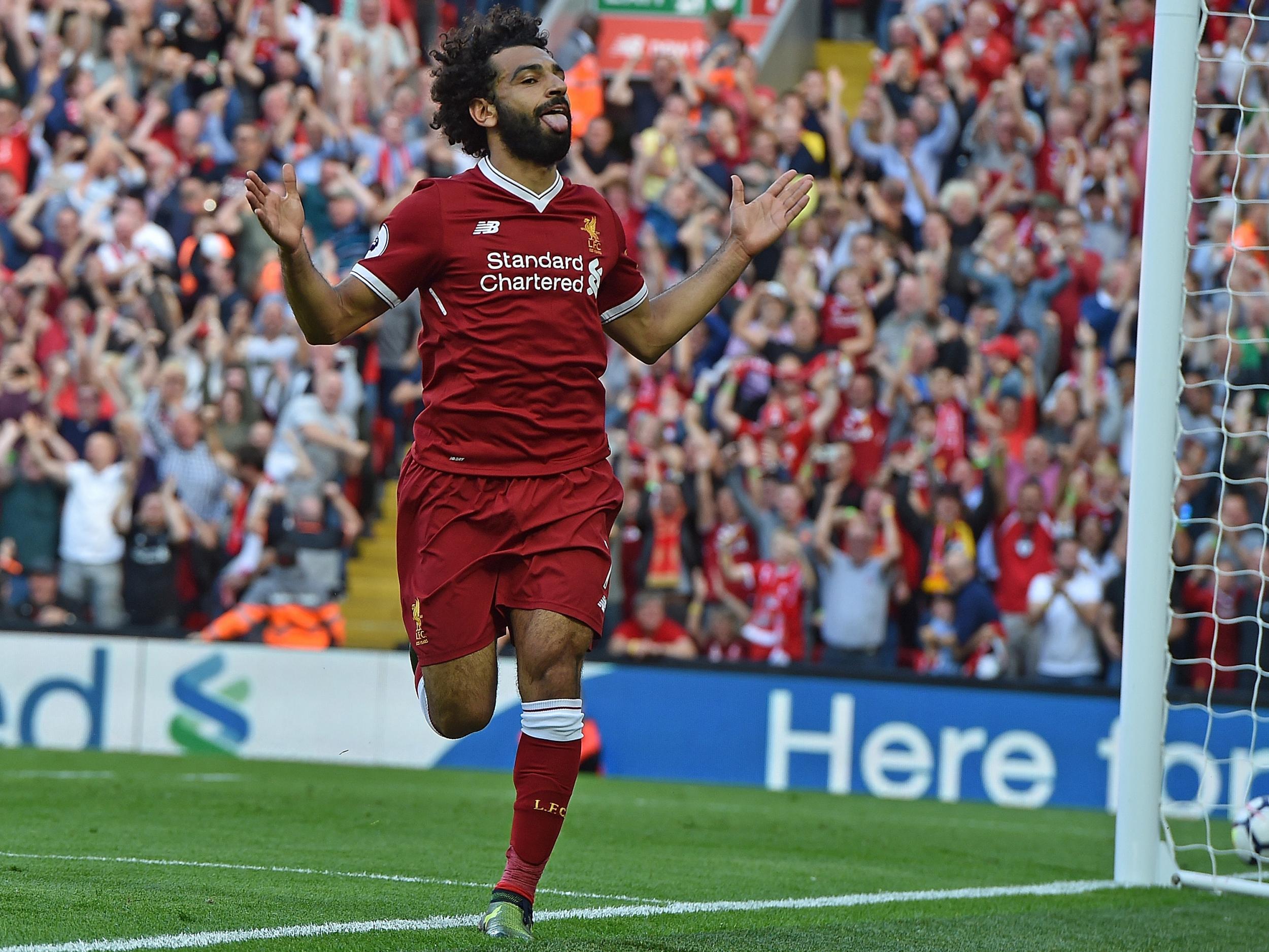 Mohamed Salah celebrates scoring for Liverpool against Arsenal