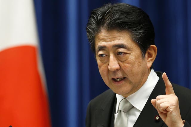 Prime Minister Shinzo Abe expressed his 'strong commitment' to defending Japan