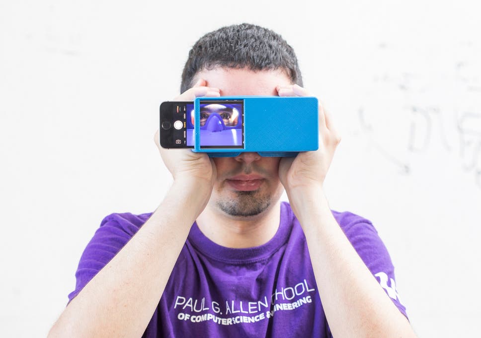 Users, wearing specially designed paper glasses or holding a 3D-printed box, take a selfie using their smartphone