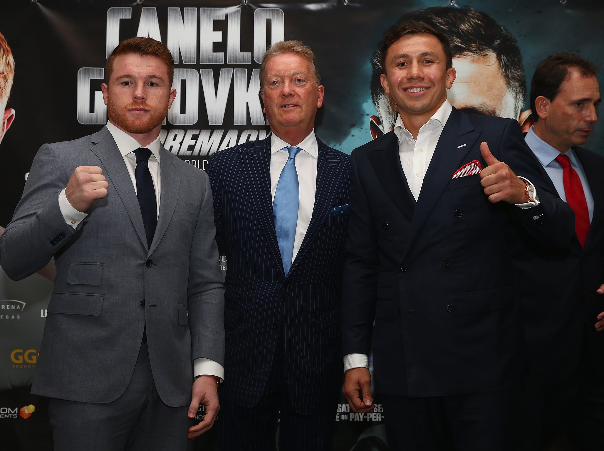 Canelo and Golovkin pose with Frank Warren