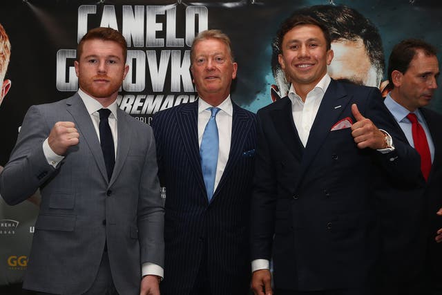 Canelo and Golovkin pose with Frank Warren